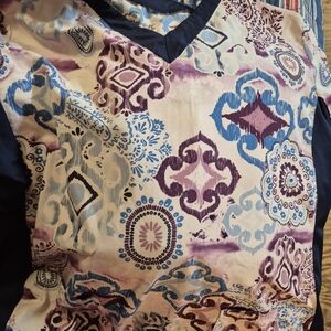 Butter soft stretch top in cream with blue and purple floral print